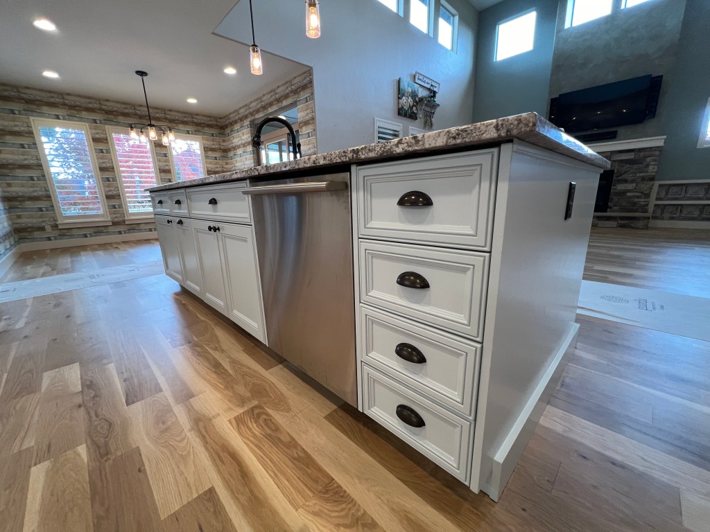 Modern kitchen with white cabinetry and island