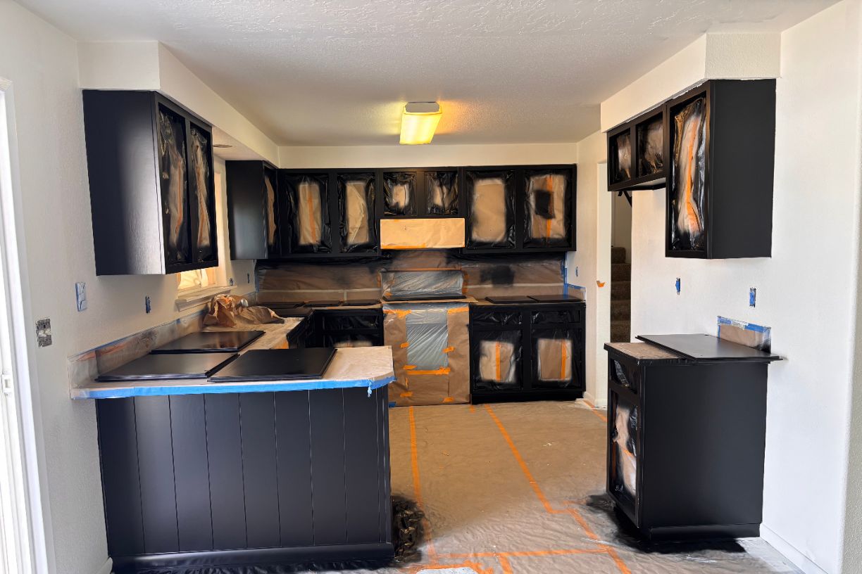 Kitchen cabinets prepped and sprayed in progress