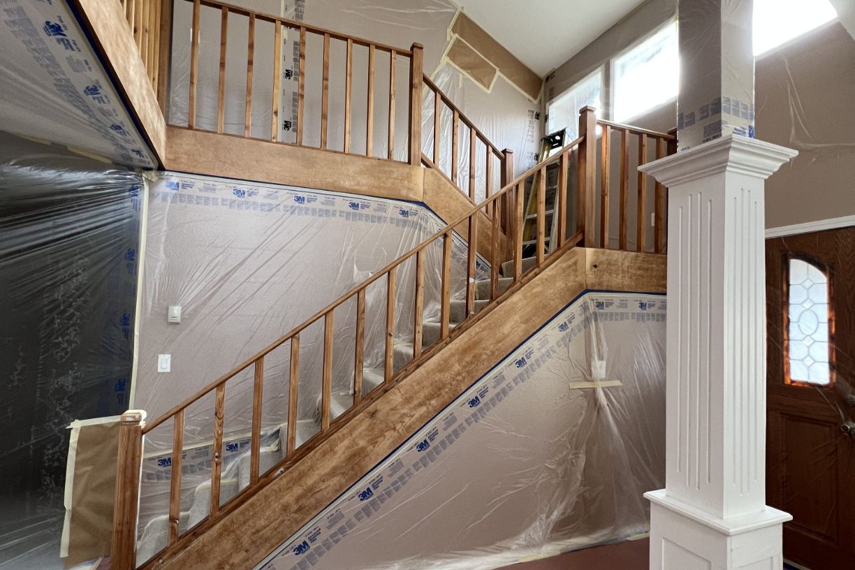 Staircase with protective covering during renovation