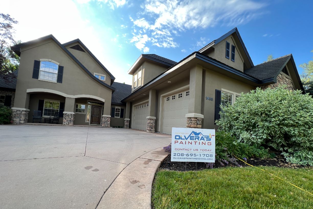 Freshly painted home with contractor sign