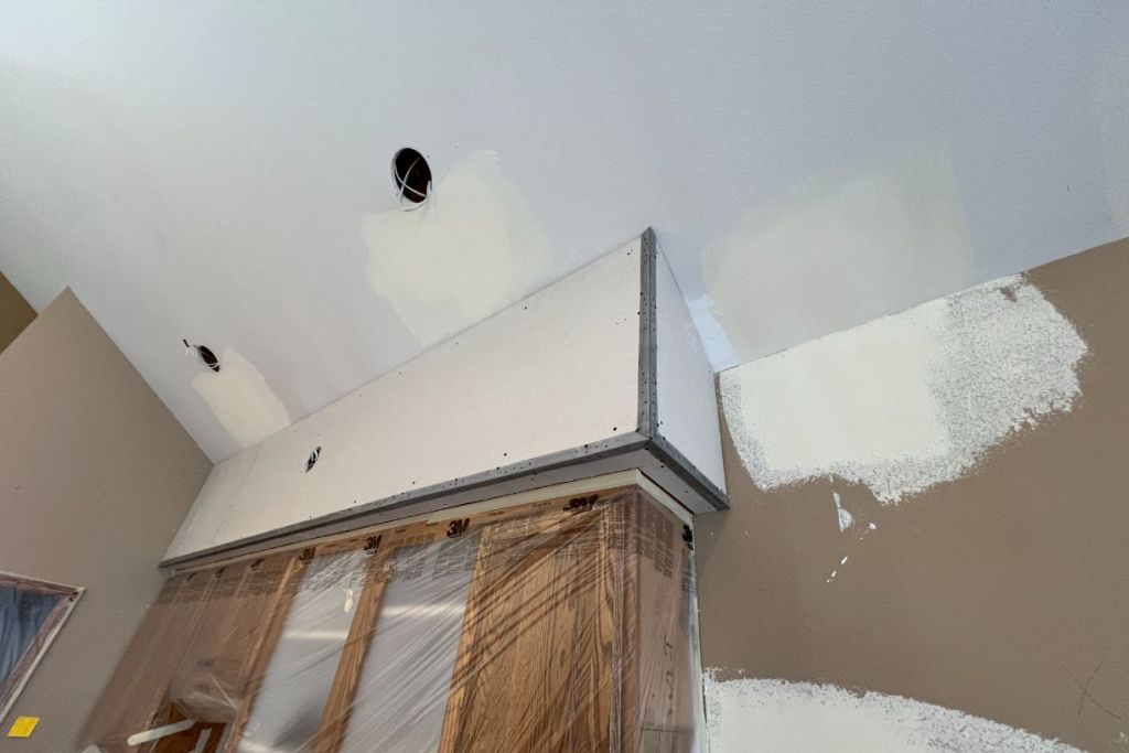 Drywall installation and patchwork on ceiling