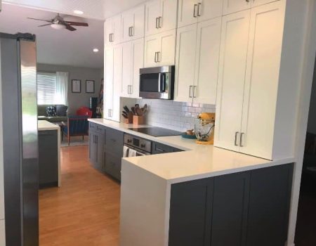Bright modern kitchen with two-tone cabinetry
