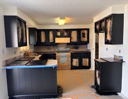 Kitchen cabinets prepped and sprayed in progress