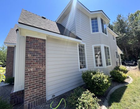 House exterior corner with landscaping shrubs